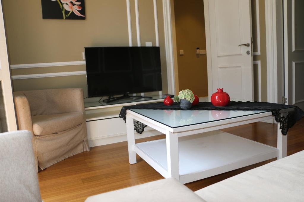 TV a/nebo společenská místnost v ubytování Triada Hotel Taksim - Special Category