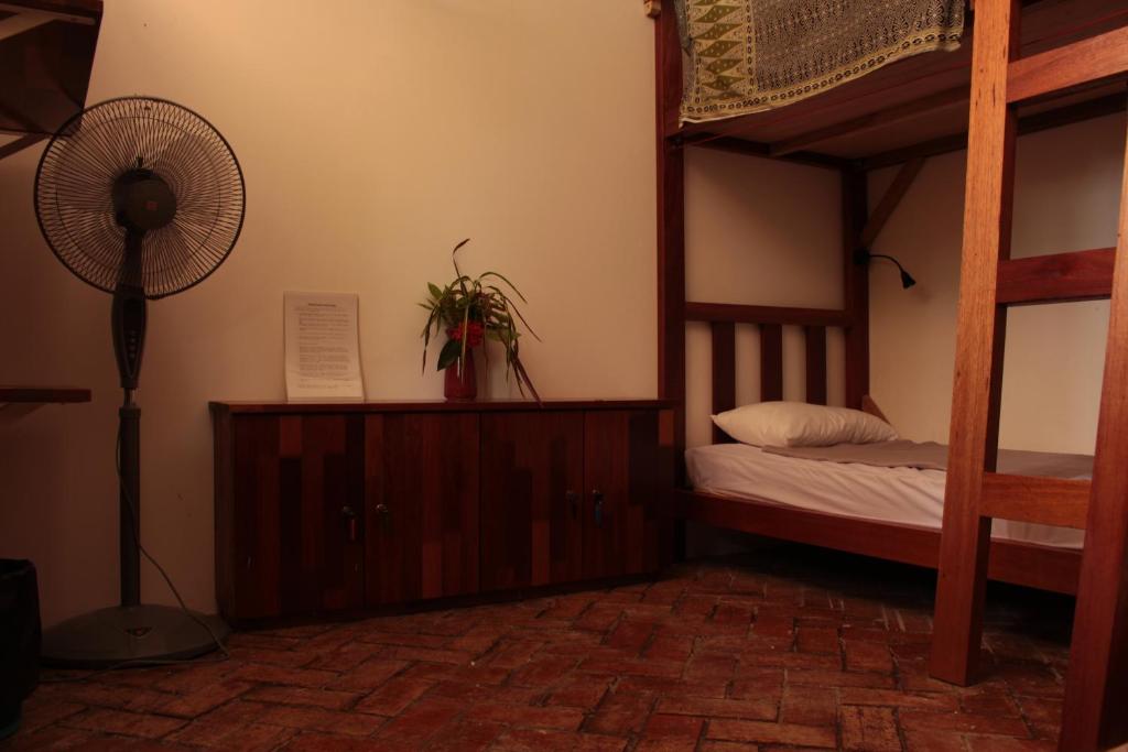 Postel nebo postele na pokoji v ubytování Nanga Damai Homestay