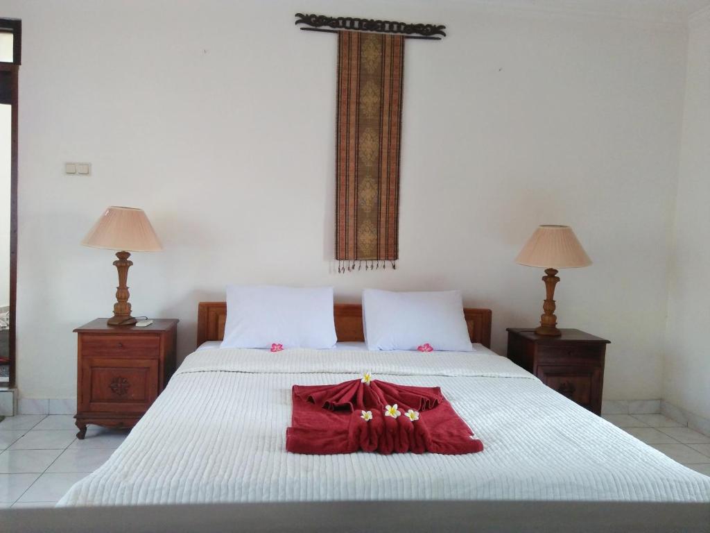 Postel nebo postele na pokoji v ubytování Nuriani Guest House