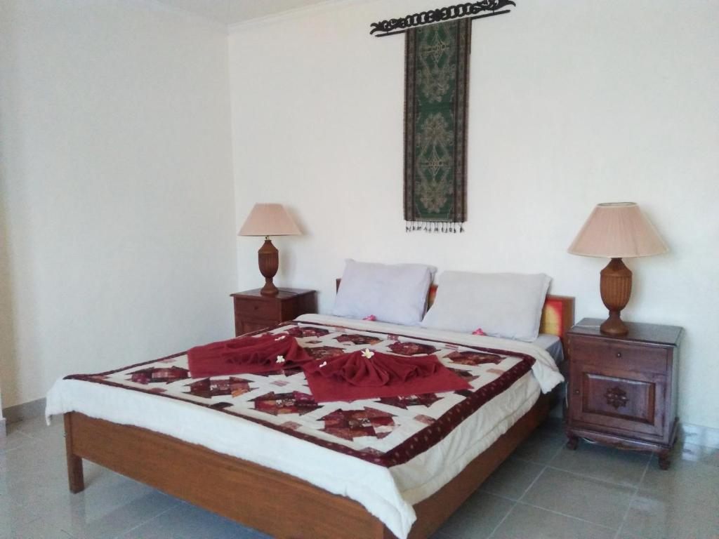 Postel nebo postele na pokoji v ubytování Nuriani Guest House