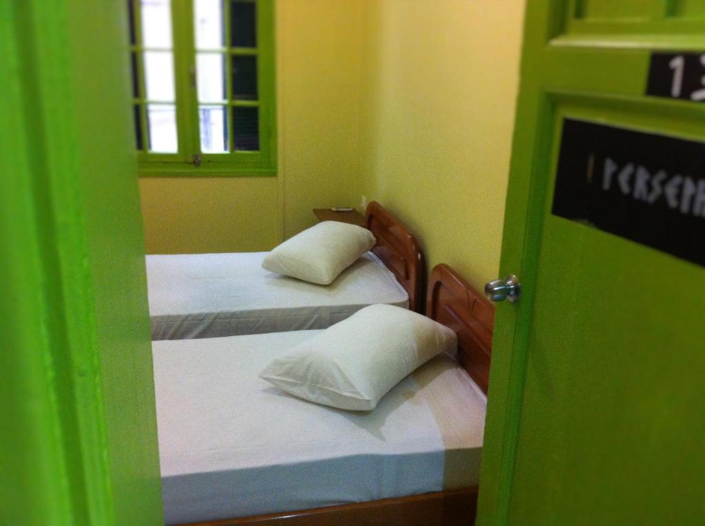 Posteľ alebo postele v izbe v ubytovaní Zeus Hostel