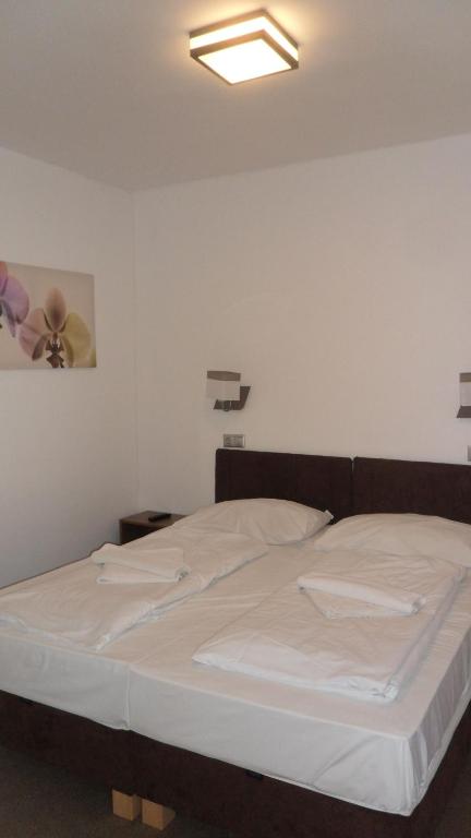 Postel nebo postele na pokoji v ubytování Nereus Park Hotel