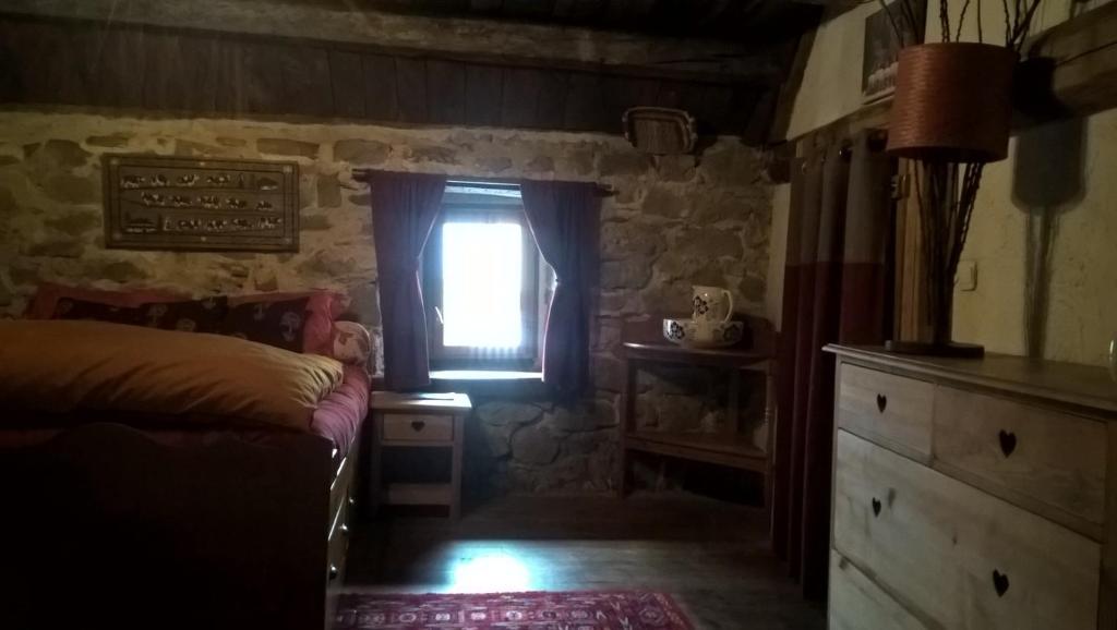 Postel nebo postele na pokoji v ubytování Gite Du Bois De L'ours