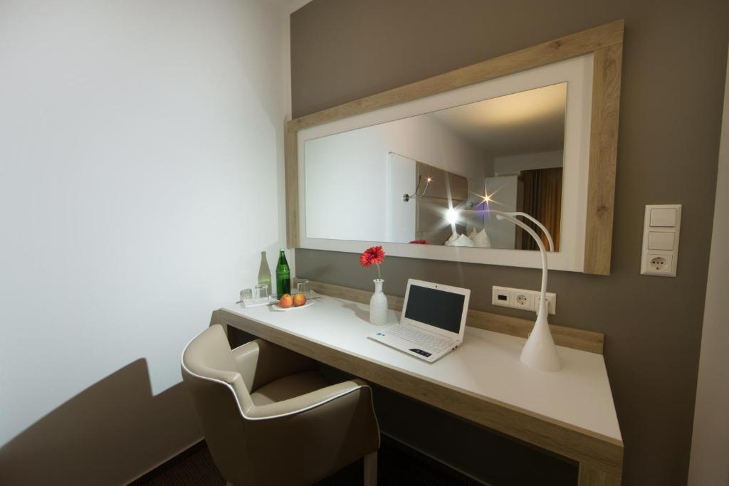 TV/Unterhaltungsangebot in der Unterkunft Confour Hotel