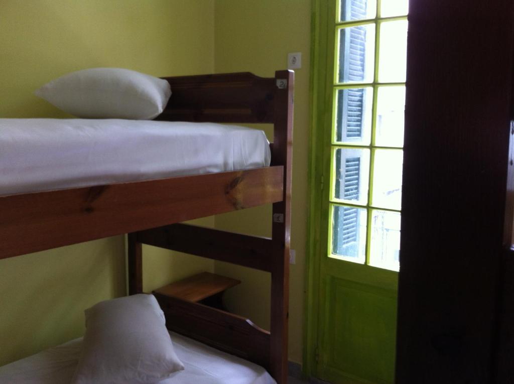 Posteľ alebo postele v izbe v ubytovaní Zeus Hostel