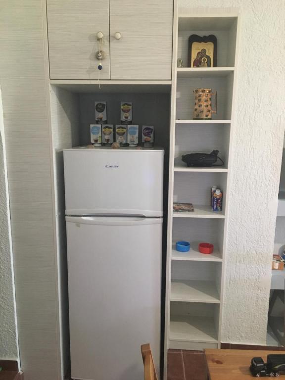 Kuchyň nebo kuchyňský kout v ubytování veranda