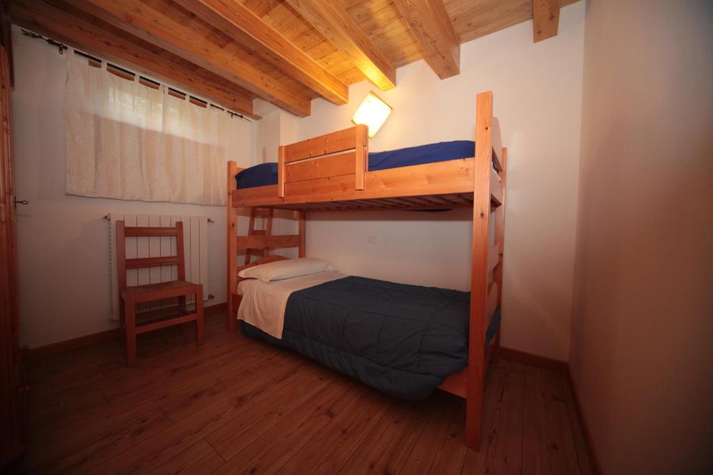 Postel nebo postele na pokoji v ubytování Albergo Diffuso Valcellina e Val Vajont in Erto