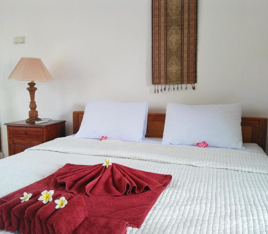 Postel nebo postele na pokoji v ubytování Nuriani Guest House
