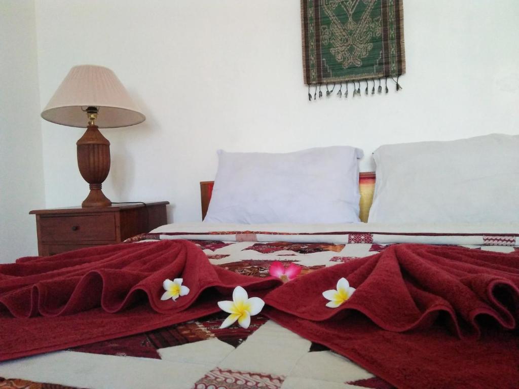 Postel nebo postele na pokoji v ubytování Nuriani Guest House