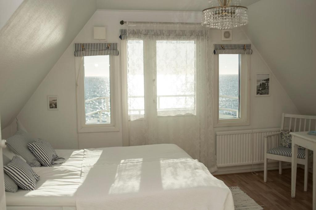 Postel nebo postele na pokoji v ubytování Pensionat Strandgården