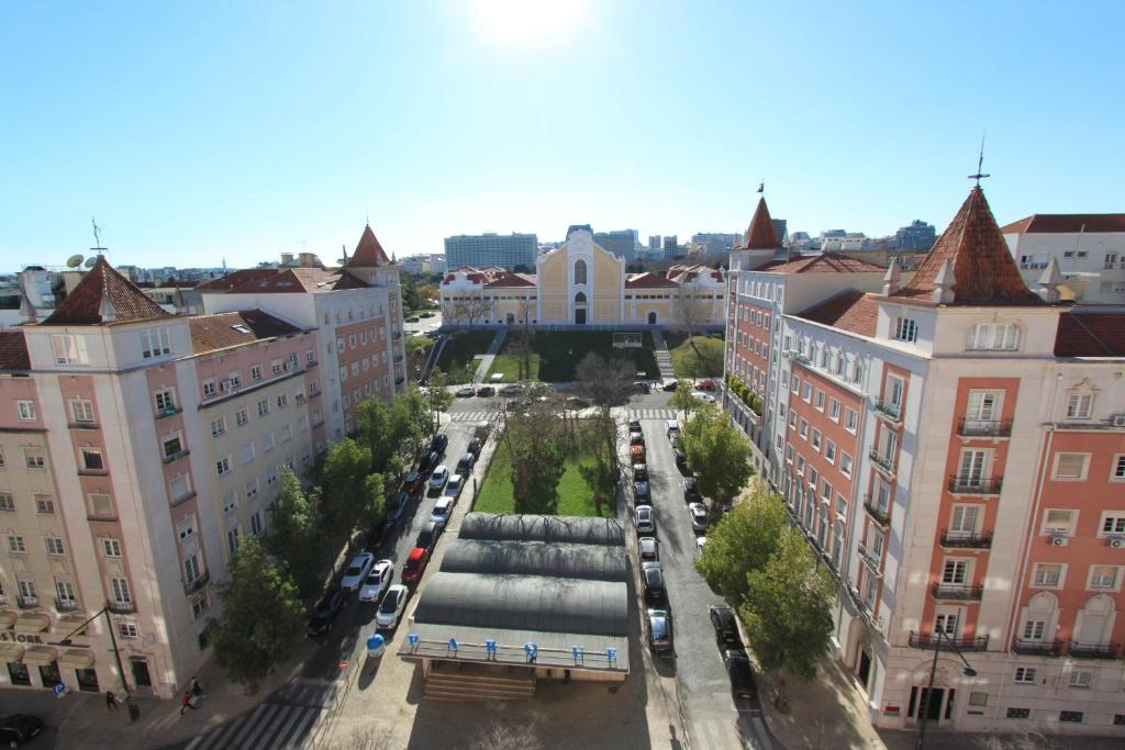 Nespecifikovaný výhled na destinaci Lisabon nebo výhled na město při pohledu z penzionu