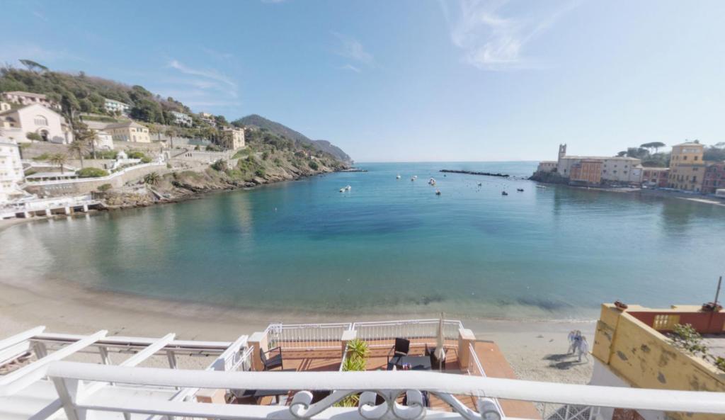 a view of a beach with people in the water at Hotel Miramare & Spa in Sestri Levante