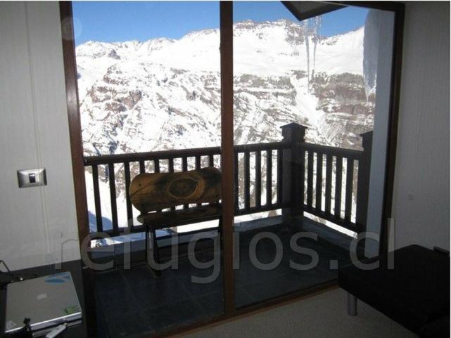 a balcony with a view of a snow covered mountain at Valle Nevado in Valle Nevado