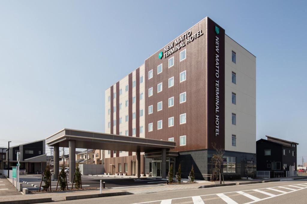 uma representação de um hotel com um edifício em New Matto Terminal Hotel em Hakusan