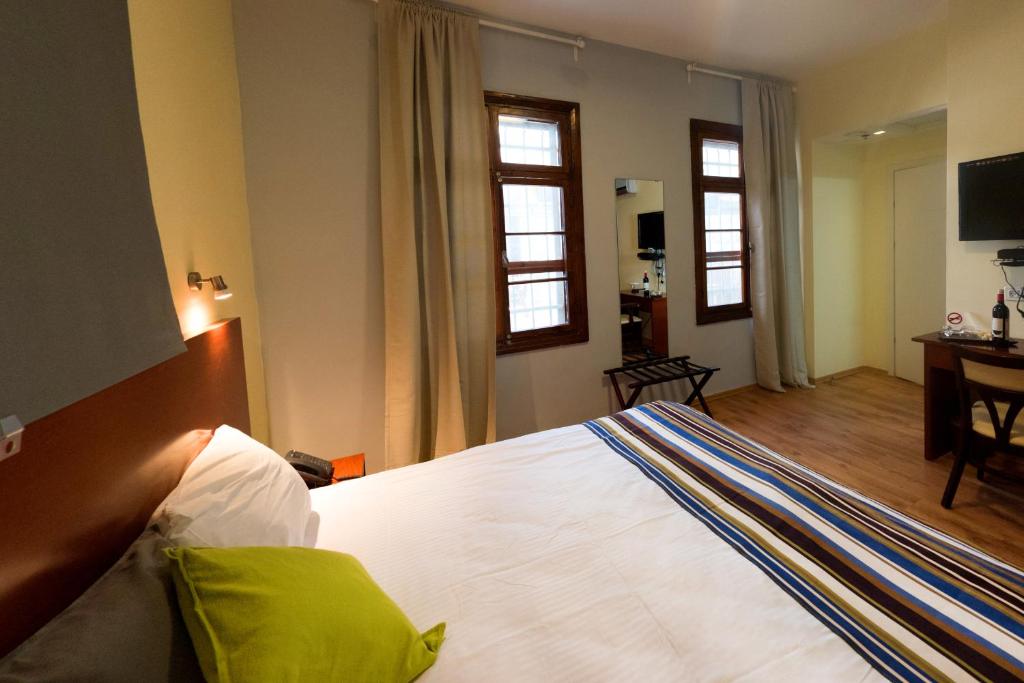 Postel nebo postele na pokoji v ubytování Villa Nazareth B&B