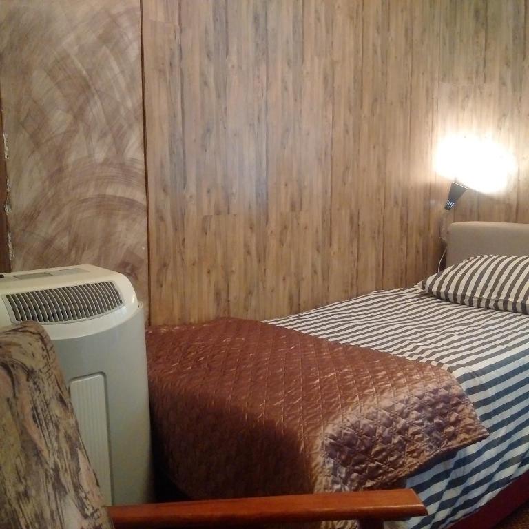 Postel nebo postele na pokoji v ubytování Expo Home Stay