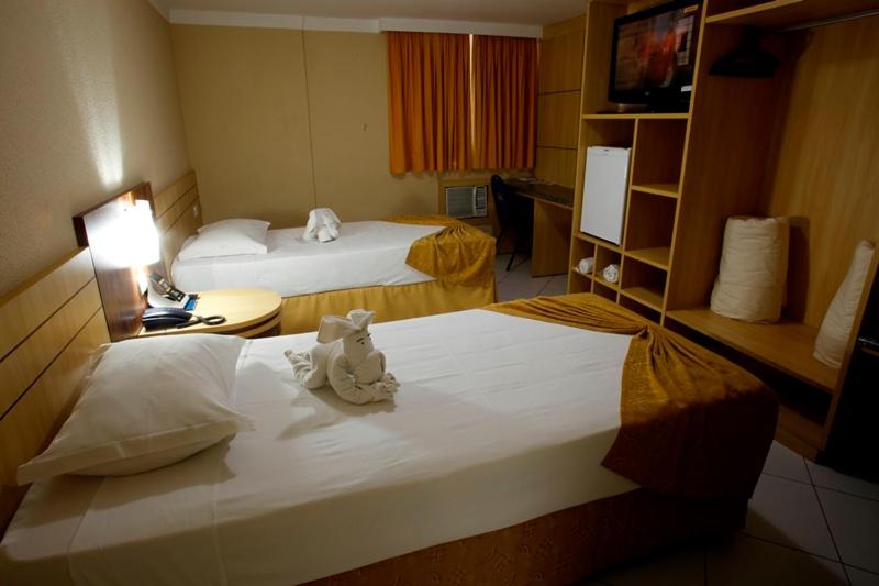 Postel nebo postele na pokoji v ubytování King Konfort Hotel