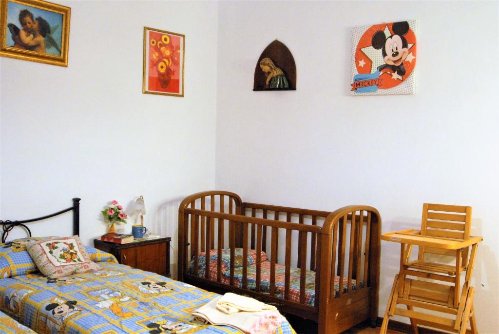 Postel nebo postele na pokoji v ubytování La Capannella