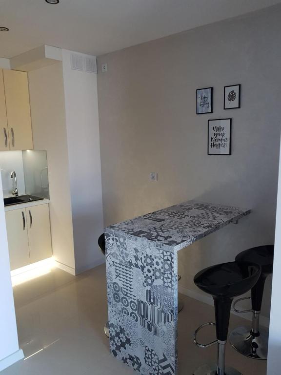 Posteľ alebo postele v izbe v ubytovaní Apartament Marina View