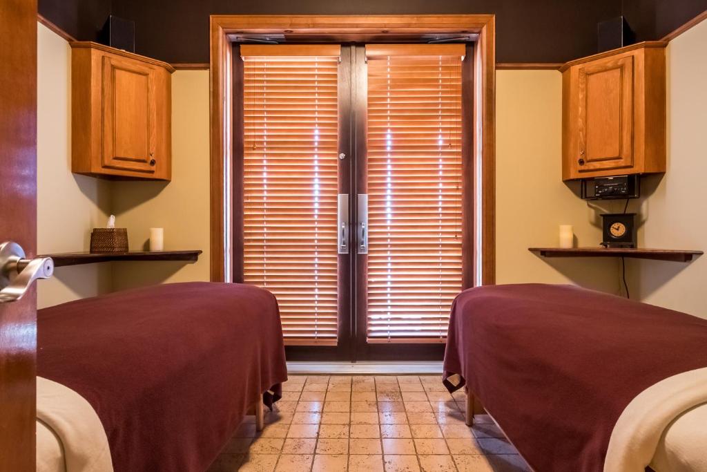 Postel nebo postele na pokoji v ubytování Hotel Quintessence