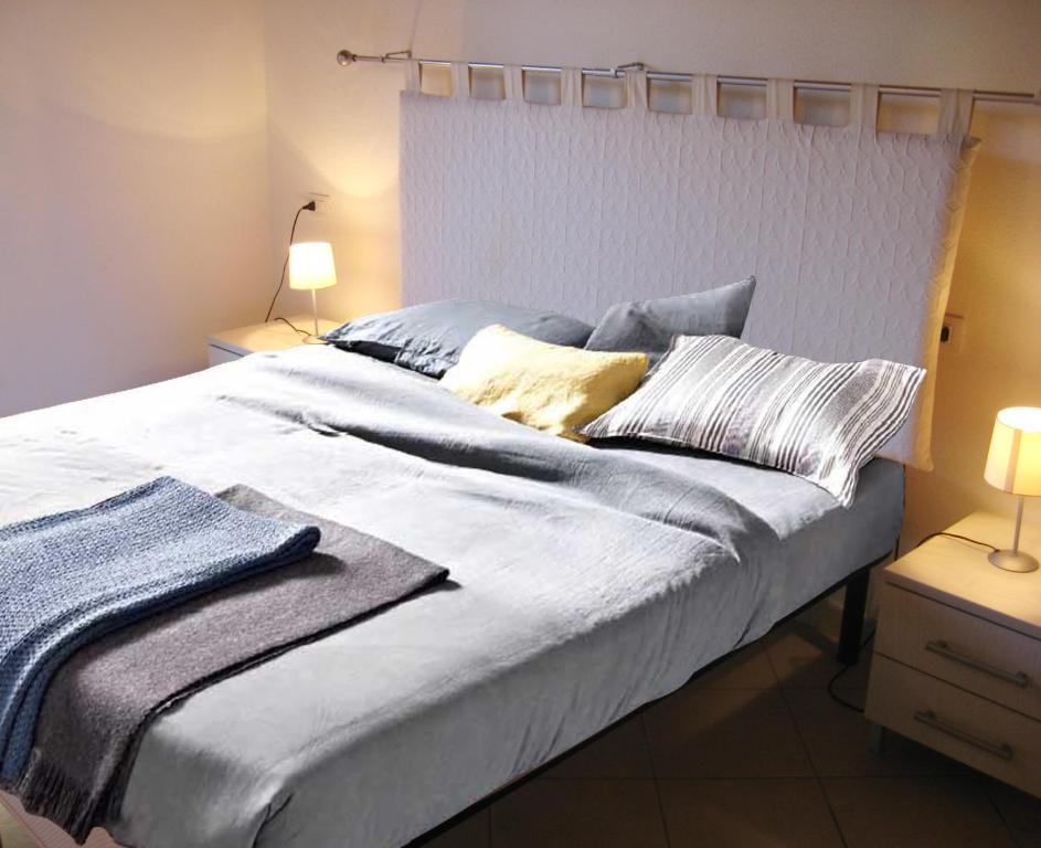 Katil atau katil-katil dalam bilik di Villa Niko