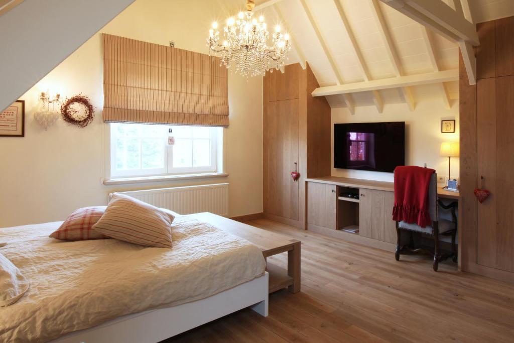 Postel nebo postele na pokoji v ubytování B&B Villa Sans Soucis