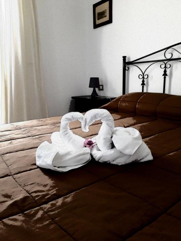 Postel nebo postele na pokoji v ubytování Sciacca Bed and Breakfast Natoli