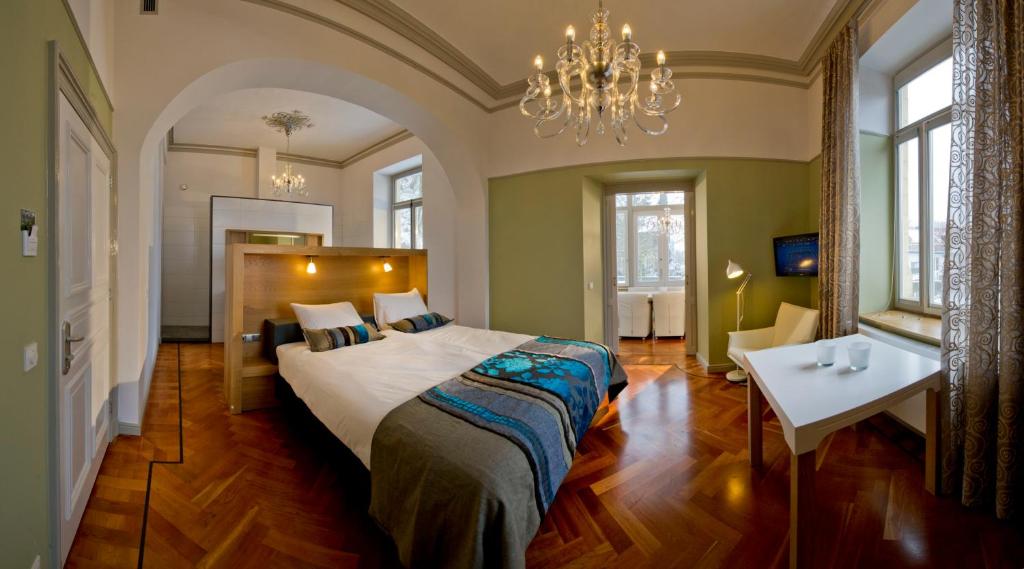 Postel nebo postele na pokoji v ubytování Villa Valkenburg