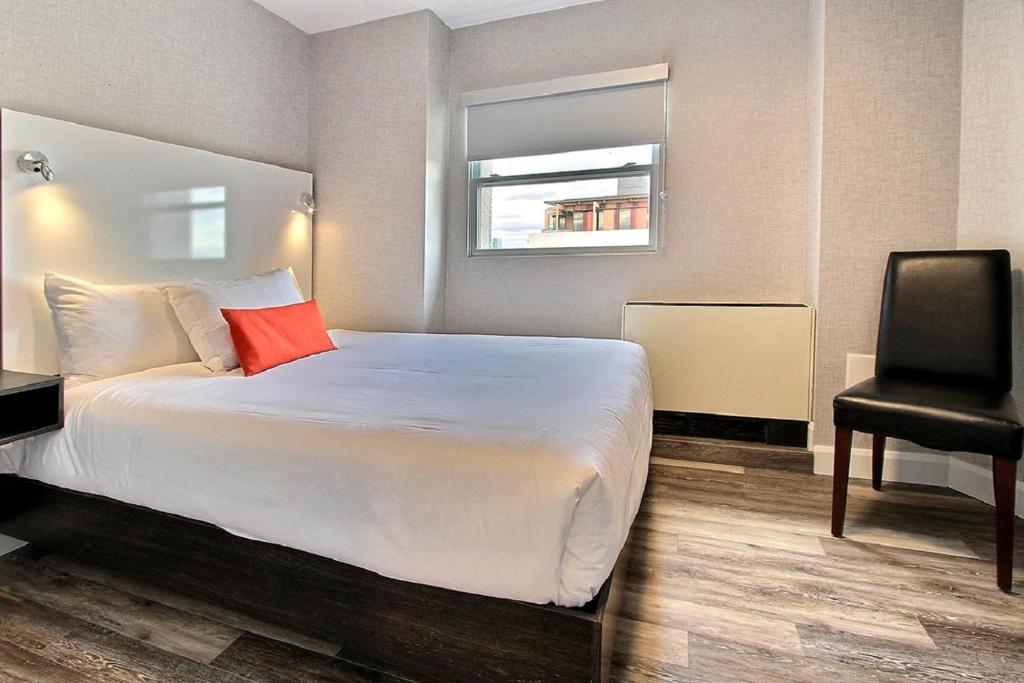 Postel nebo postele na pokoji v ubytování Hotel Classique