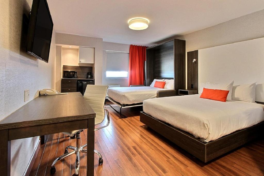 Postel nebo postele na pokoji v ubytování Hotel Classique