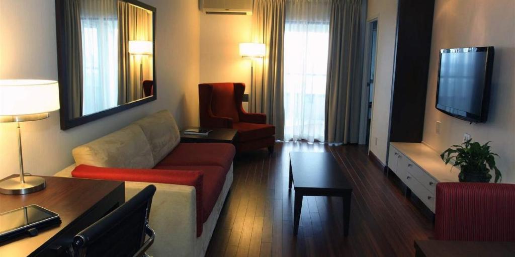 TV a/nebo společenská místnost v ubytování Hotel Classique