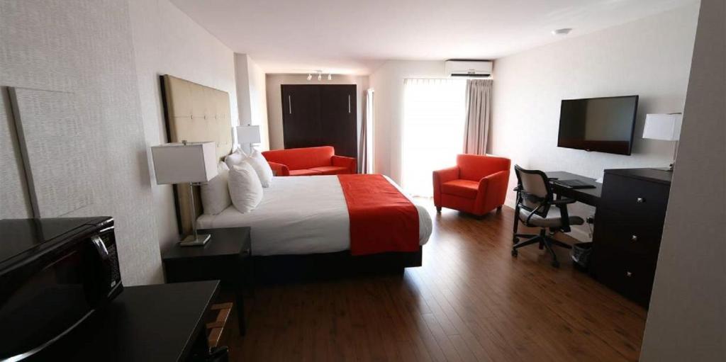 Postel nebo postele na pokoji v ubytování Hotel Classique