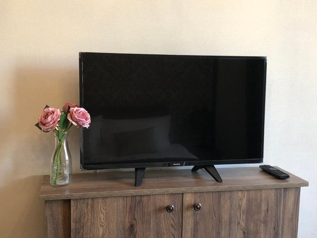 TV a/nebo společenská místnost v ubytování habitat Holiday Apartment