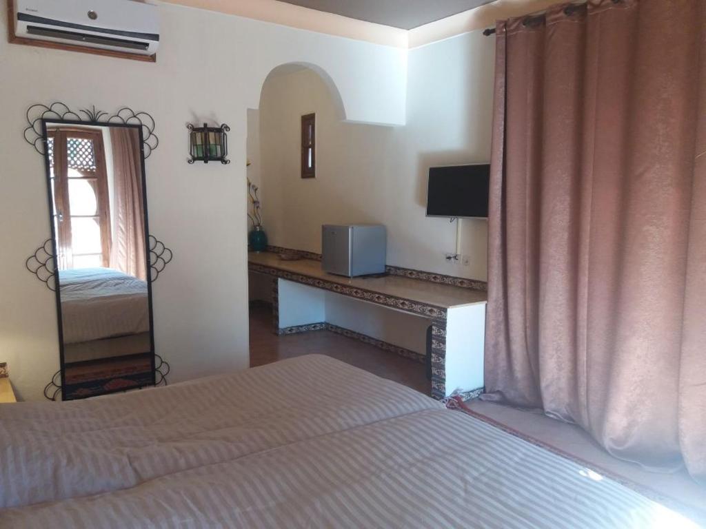 Postel nebo postele na pokoji v ubytování Hotel Club Hanane