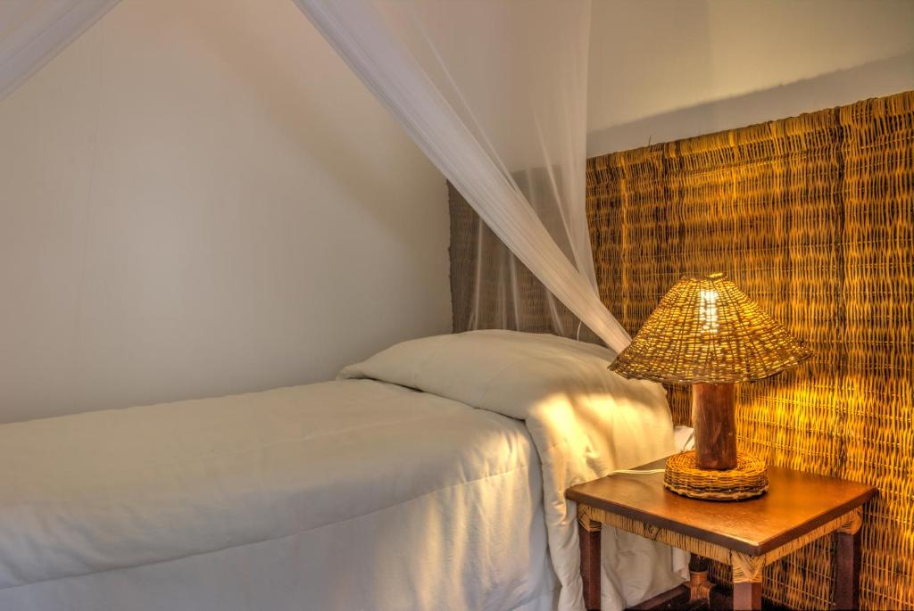 Postel nebo postele na pokoji v ubytování Beijamar Praia Hotel