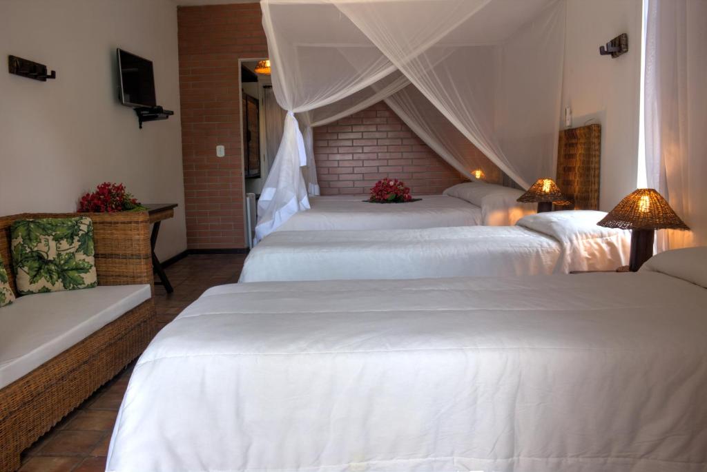 Postel nebo postele na pokoji v ubytování Beijamar Praia Hotel