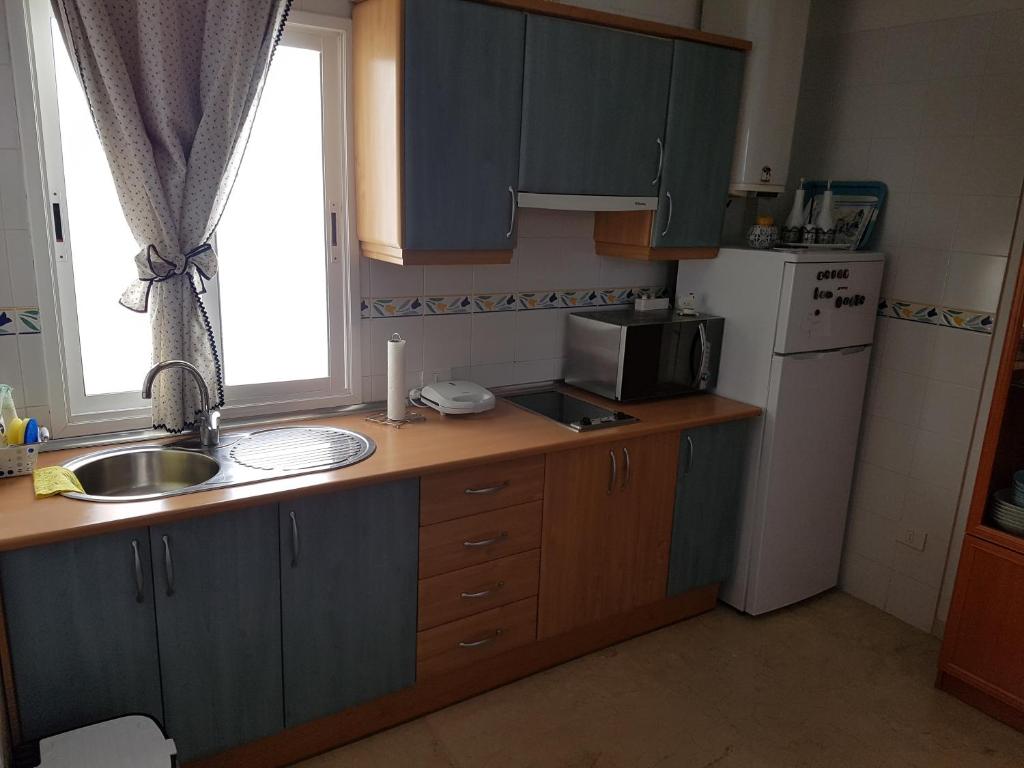 Kuchyň nebo kuchyňský kout v ubytování Apartamento San Sebastián de la Gomera