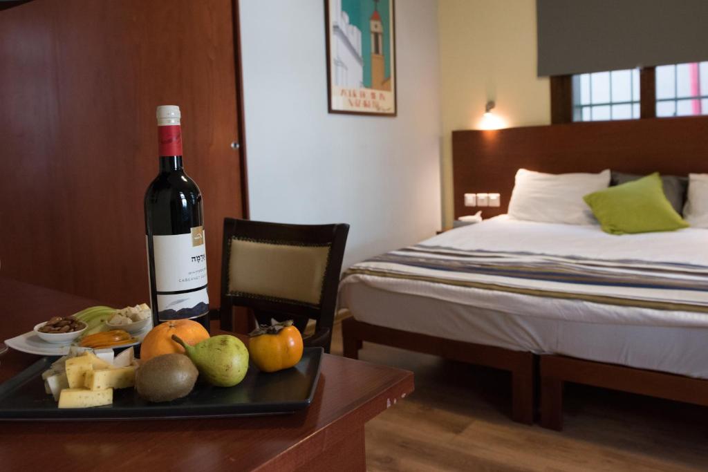 Postel nebo postele na pokoji v ubytování Villa Nazareth B&B