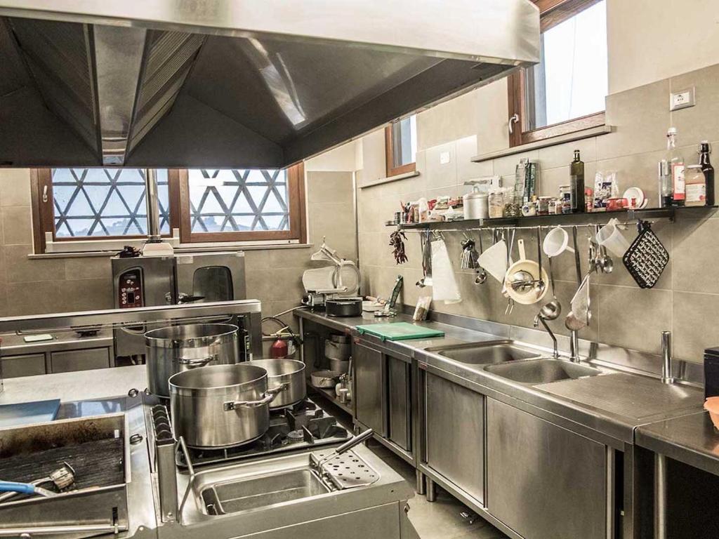 Kuchyň nebo kuchyňský kout v ubytování Agriturismo Cignale