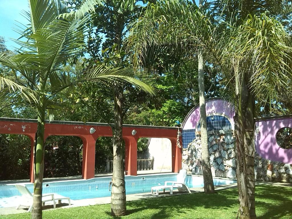 Bazén v ubytování Hotel Hacienda Xico Inn nebo v jeho okolí