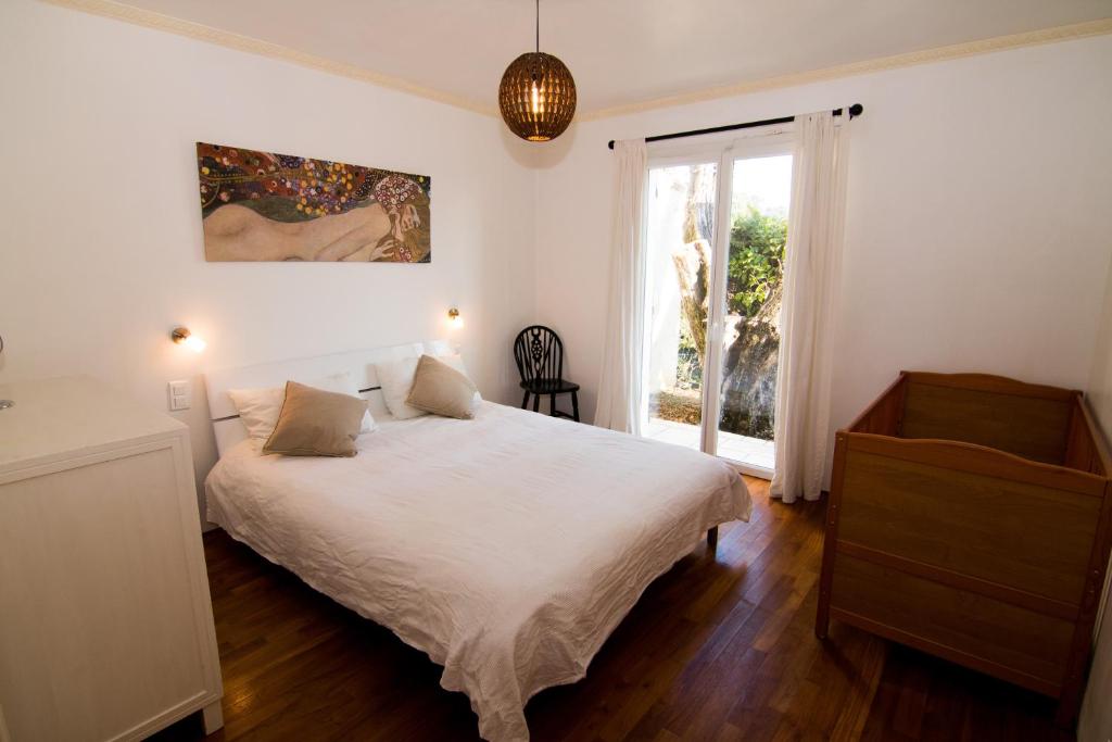 Cama o camas de una habitación en Villa Ad Alta