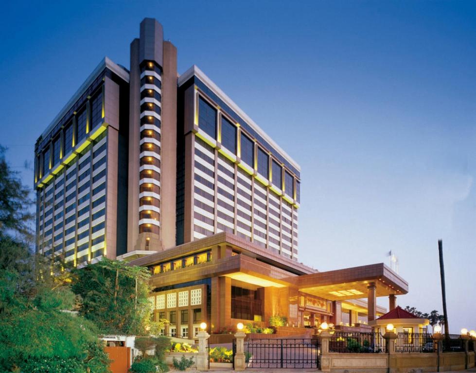 a large building with a building at Taj Lands End in Mumbai