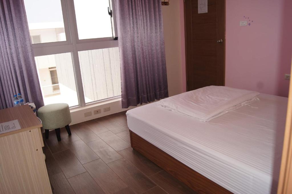 Postel nebo postele na pokoji v ubytování Shimmer B&B