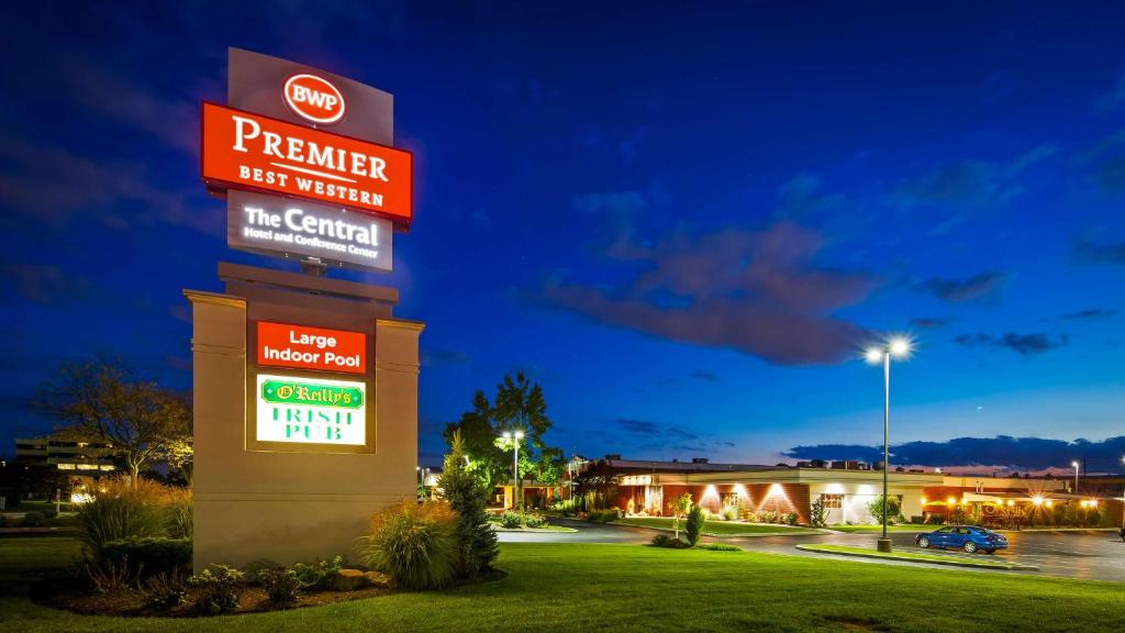 a sign for a premier first rite hospital at night at Best Western Premier the Central Hotel & Conference Center in Harrisburg