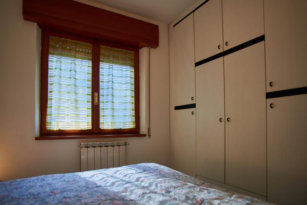 Posteľ alebo postele v izbe v ubytovaní B&B La Bredia