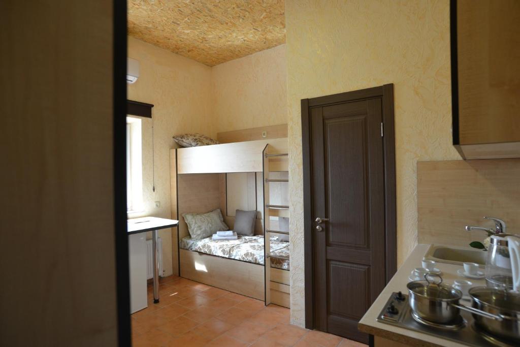 Kuchyň nebo kuchyňský kout v ubytování Logovo Hostel