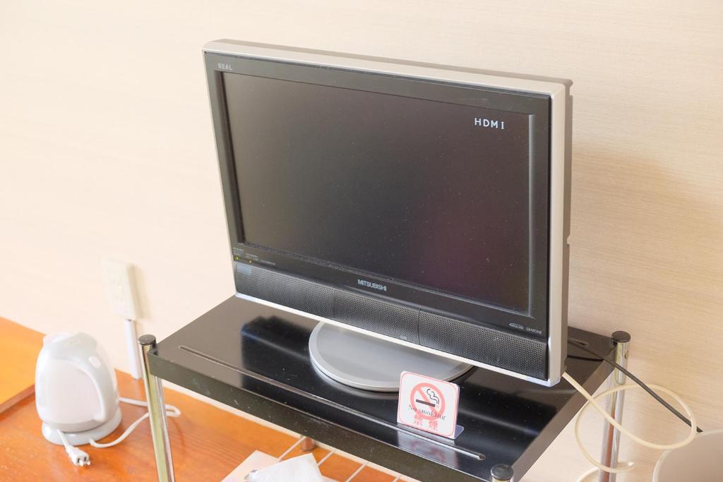 TV a/nebo společenská místnost v ubytování Hotel Sunset Susami