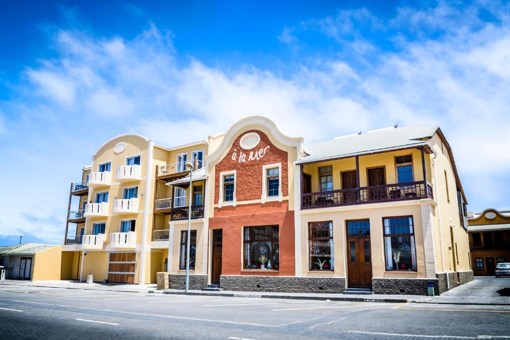 a building on the side of a street at Hotel A la Mer in Swakopmund
