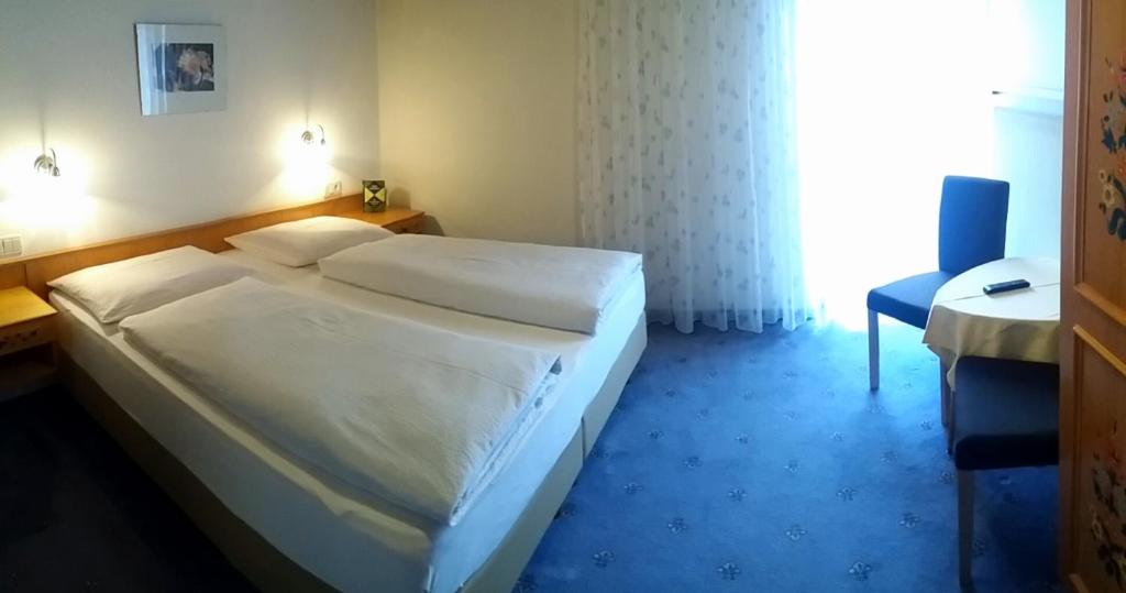 Postel nebo postele na pokoji v ubytování Gletscherblick