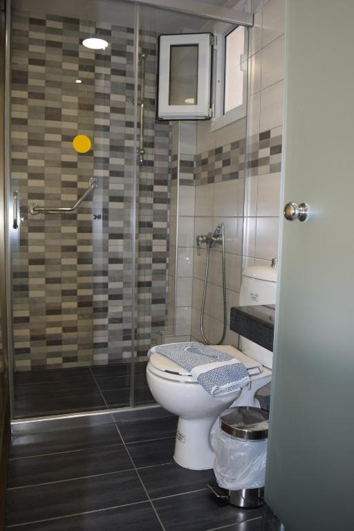 Koupelna v ubytování Paspalis Hotel